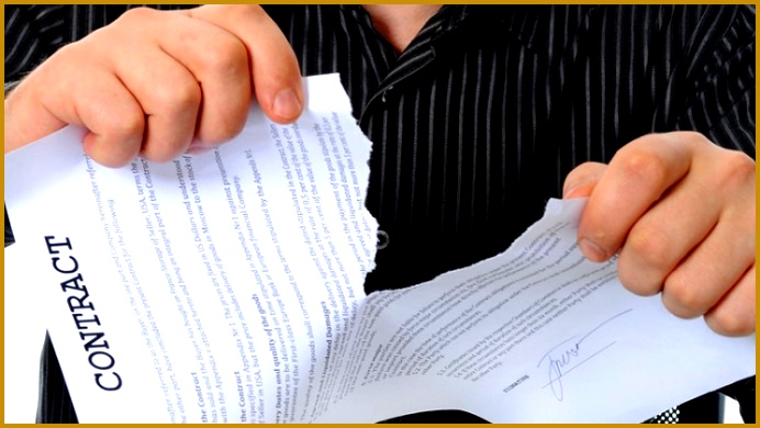 Man tearing up contract 390692