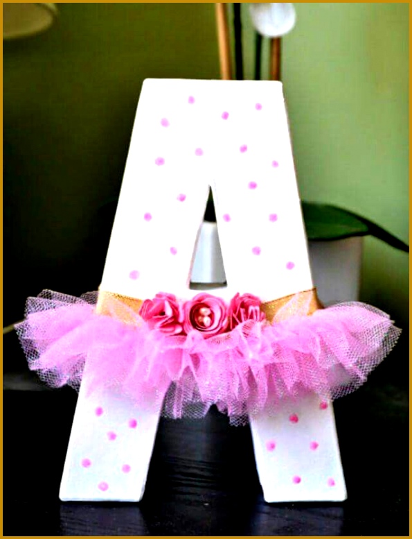 Wooden letter decorated with a tutu 777595